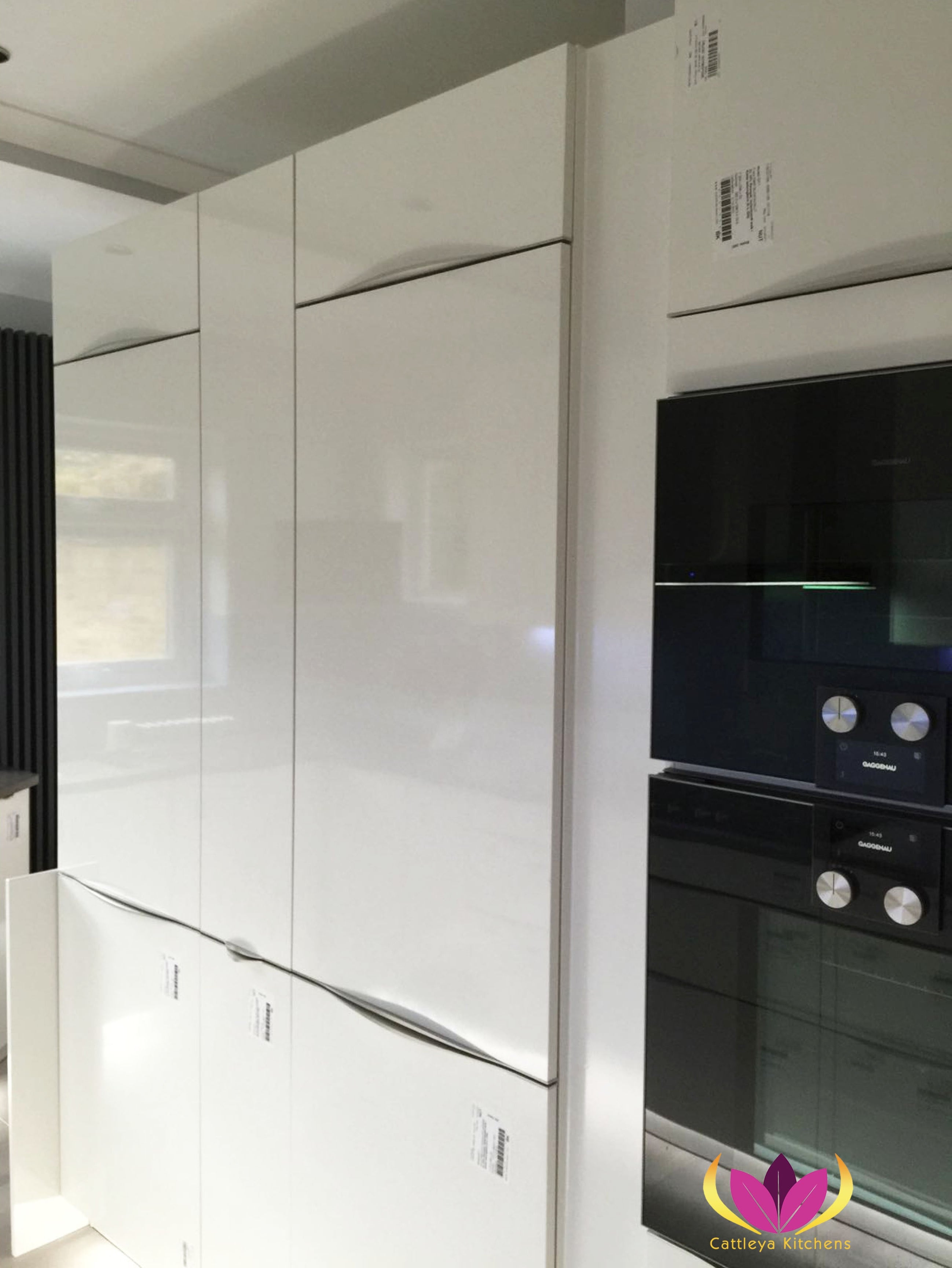 White gloss tall cabinet units Ealing Finished Kitchen Project