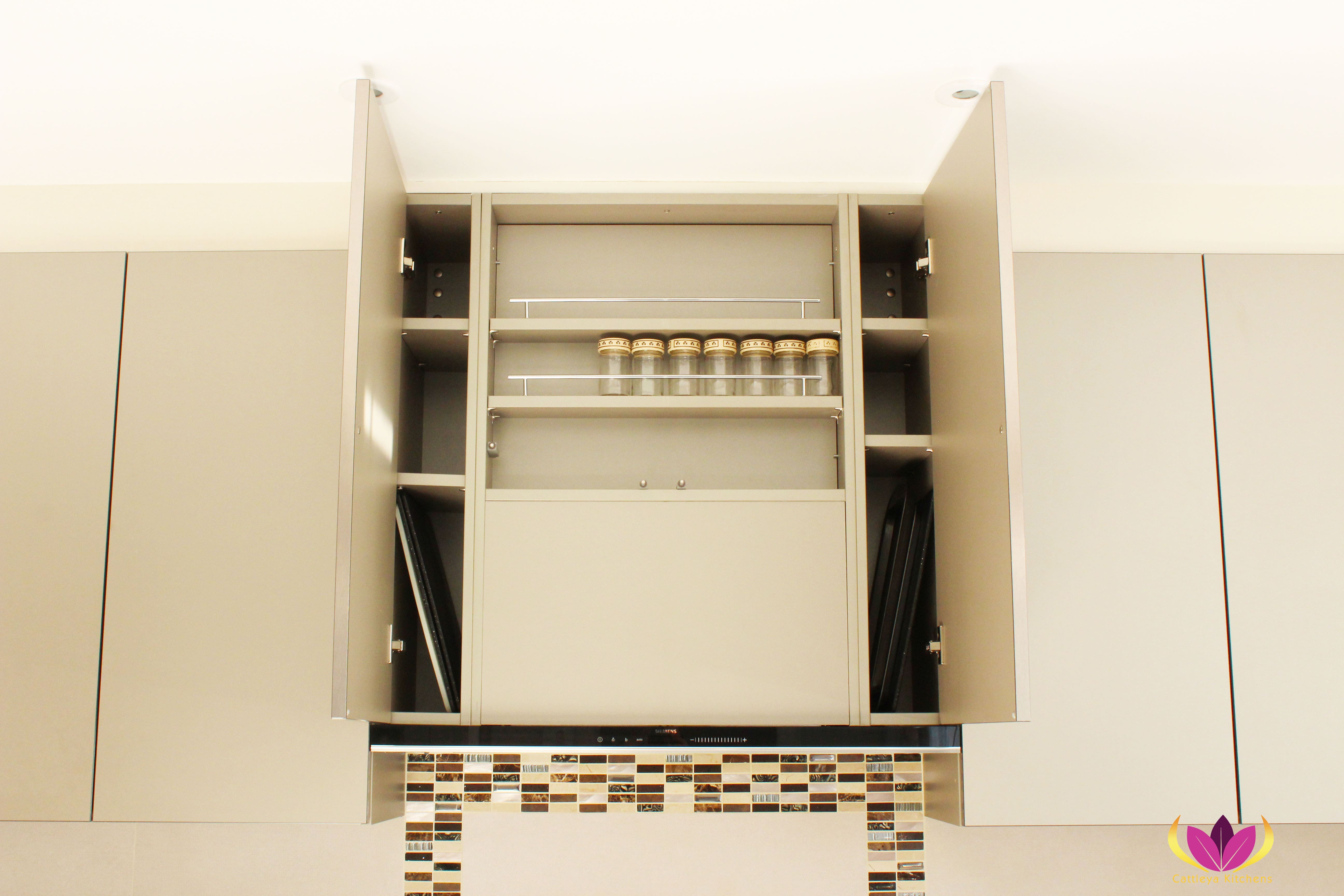 Organised cabinet with layered shelving Ealing Finished Kitchen Project