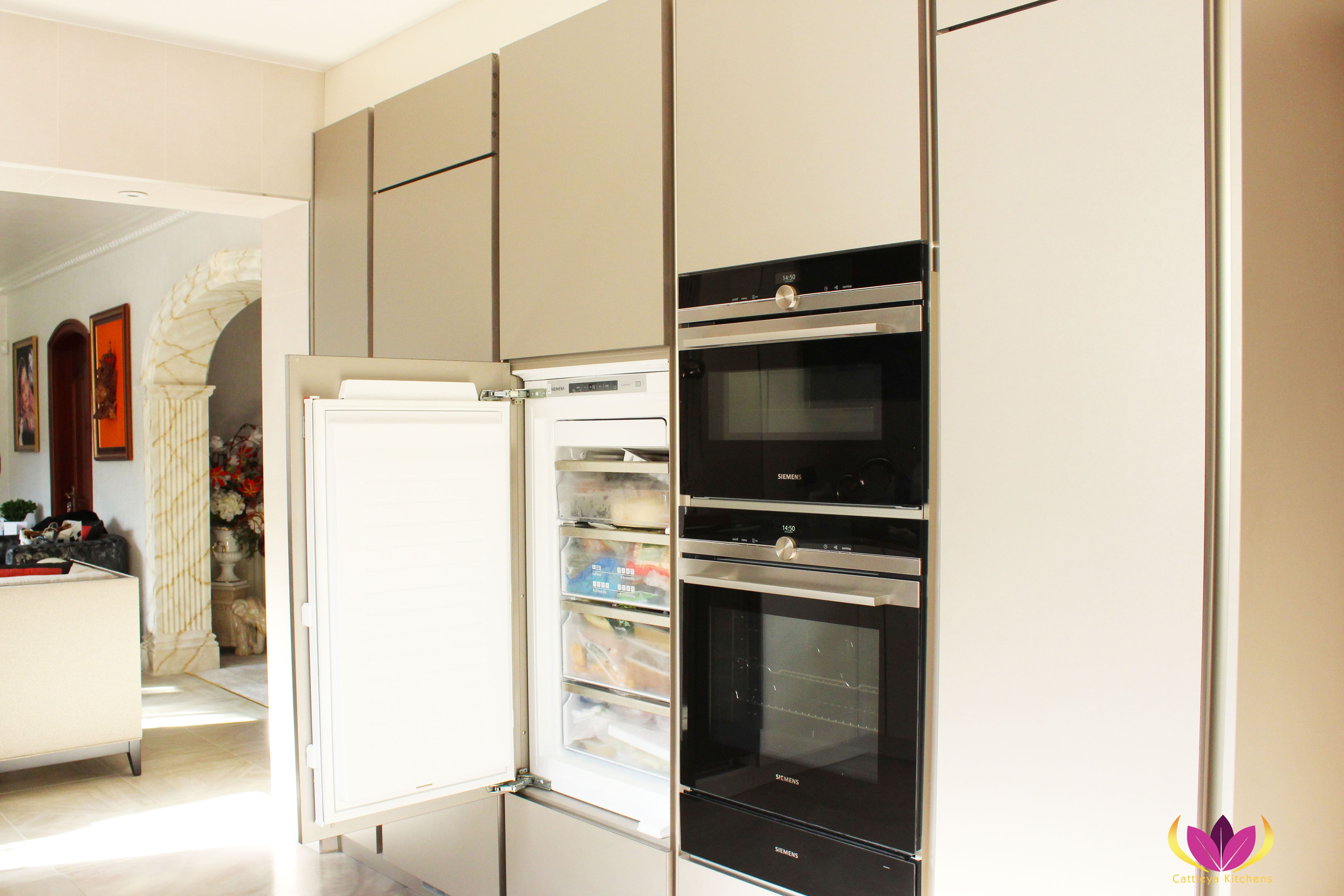 Refriigerator tucked in a cabinet Ealing Finished Kitchen Project