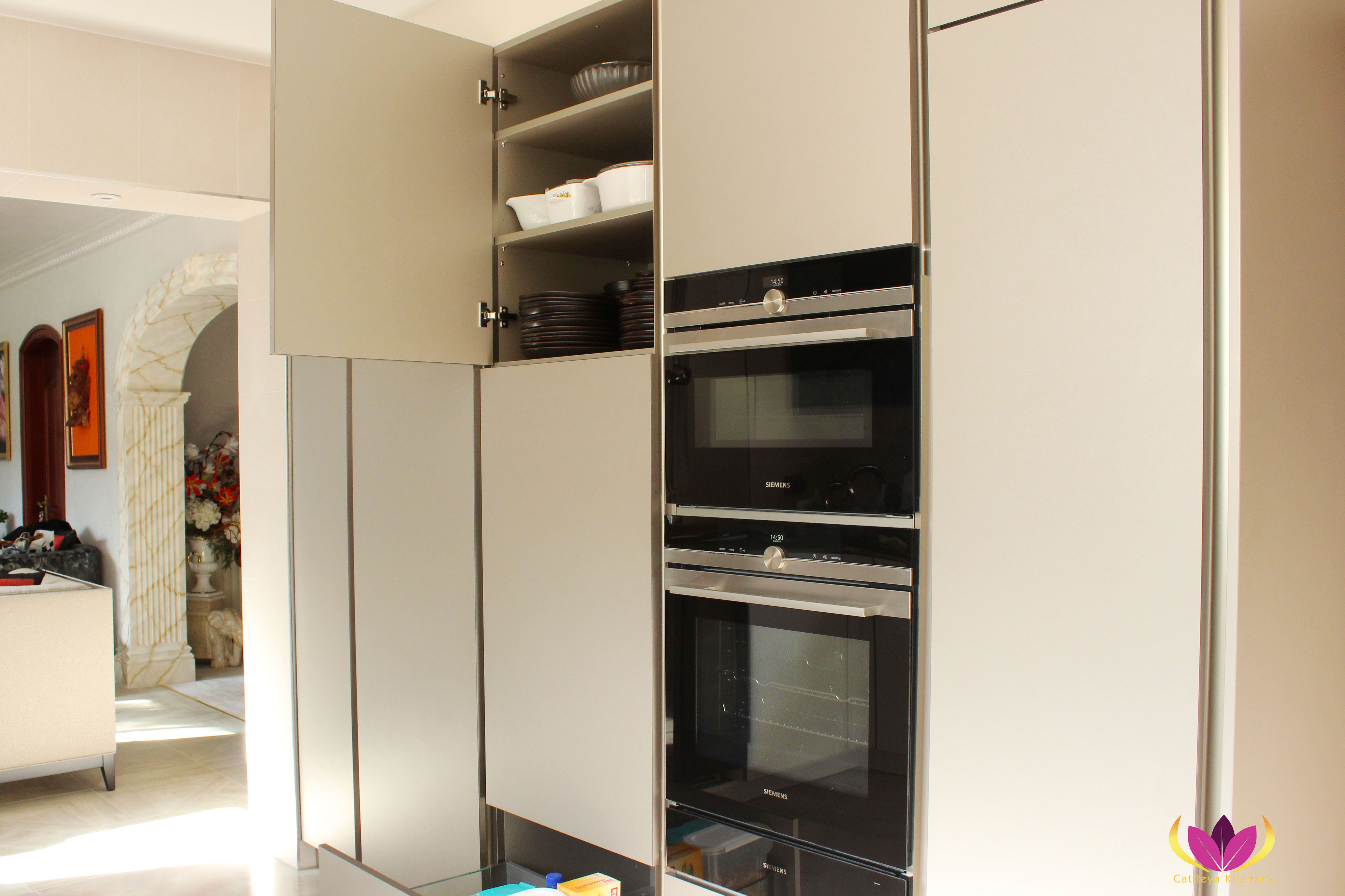 Layered shelving inside cabinet unit Ealing Finished Kitchen Project