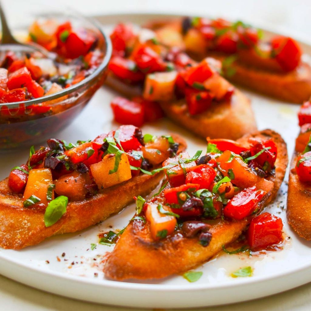 Bruschetta with Heirloom Tomatoes, Olives, and Basil